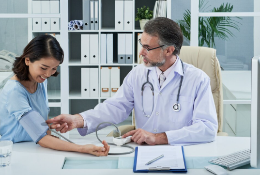 Doctor consulting a patient